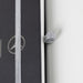 Discovery A5 Notebook - A black A5 notebook with a silver elastic band and a logo on the cover.