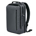 Hedmark Commuter Backpack - A sleek grey backpack with padded straps and multiple compartments, featuring a logo on the side.