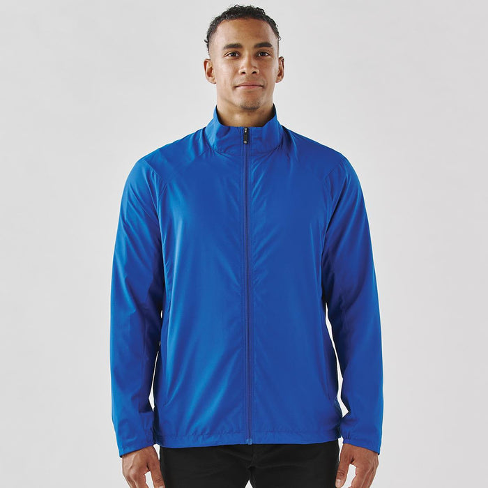 Men's Pacifica Full Zip Jacket - A men's full zip jacket in bright blue, featuring a high collar and a logo. Perfect for rain protection.