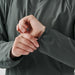 Women's Pacifica Full Zip Jacket - A grey women's full zip rain jacket with a close-up of the cuff detail on the sleeve. It features a logo.