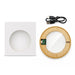 Crescent Illuminating Wireless Charger - A circular bamboo wireless charger in a white square box, with a USB charging cable included.