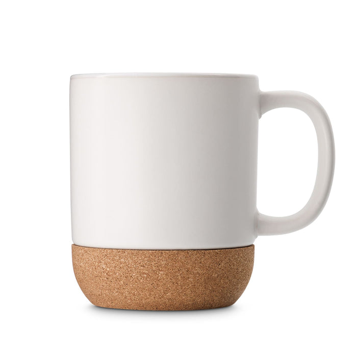 The Cosy Indulgence - A coffee mug with a white ceramic body and a cork base, featuring a simple design and a handle.