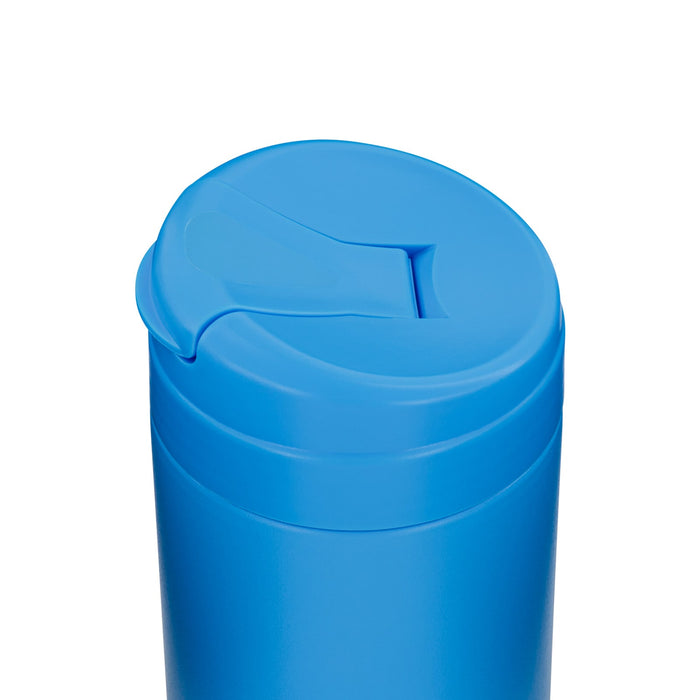 Esplanade Coffee Cup by The Line Edit. - A bright blue coffee cup with a lid featuring a small opening for sipping. It has a smooth surface and rounded design.