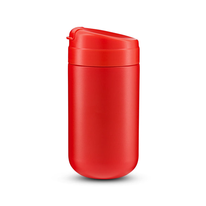 The Good Stuff Pack - A coffee cup in bright red with a secure lid and a smooth finish, featuring a logo on the side.