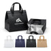 Wayfarer Cooler Bag - A black cooler bag with an insulated interior and sturdy handles, alongside options in white, navy, and brown.