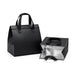 Wayfarer Cooler Bag - A black cooler bag with handles, featuring an insulated silver interior and a foldable design. It has a logo on it.