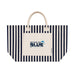 Hampton Tote Bag by The Line Edit. - A striped tote bag in navy and cream with a front pocket and a branded logo.