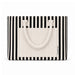 Hampton Tote Bag by The Line Edit. - A striped tote bag in black and cream with sturdy handles and a front pocket, featuring a logo.