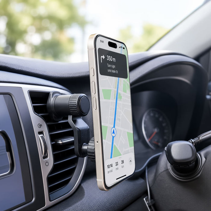 Anchor by Nomis Car Phone Holder - A car phone holder in black mounted on a dashboard air vent, displaying a smartphone with navigation.