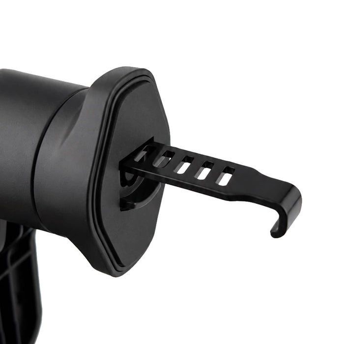 Anchor by Nomis Car Phone Holder - A black car phone holder featuring an adjustable grip mechanism for secure phone placement.