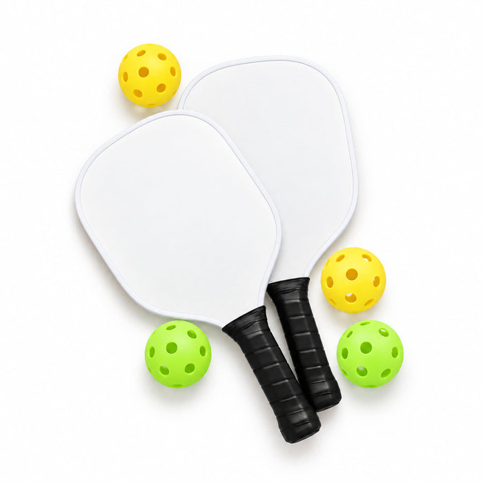Matchpoint Pickleball Set - Two white pickleball paddles with black grips and three colourful balls in yellow and green surrounding them.