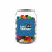 Assorted Jelly Beans in Clear Can 210g - A clear jar filled with assorted jelly beans in various colours, featuring a logo on the front.