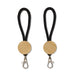 Luxeloop Keytag - A keytag featuring a round wooden element with a black rope attachment and a metal clip.
