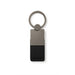 Mario Keytag - A sleek, black leather keytag with a metallic silver keyring attachment and minimalist design.