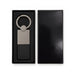 Mario Keytag - A sleek silver keytag with a leather strap, displayed in a black gift box.