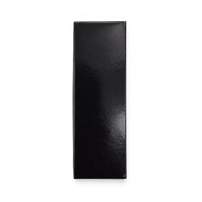 Zander Keytag - A sleek, black rectangular box with a glossy finish, featuring a logo on one side.