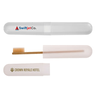 Sparkle Toothbrush Case - A clear toothbrush case with a wooden toothbrush inside. It features logos on the exterior.