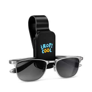 Visor Glasses Holder - A black visor glasses holder with a clip and silver sunglasses featured in front. Includes a logo design.