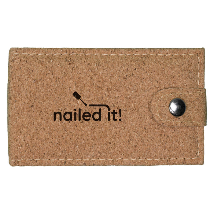 Cork Manicure Set - A cork manicure set in a beige case with a button closure and a logo printed on the front.