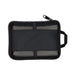 The Hustle Pack - A black zippered pouch with a mesh front and a handle, suitable for organising small items.