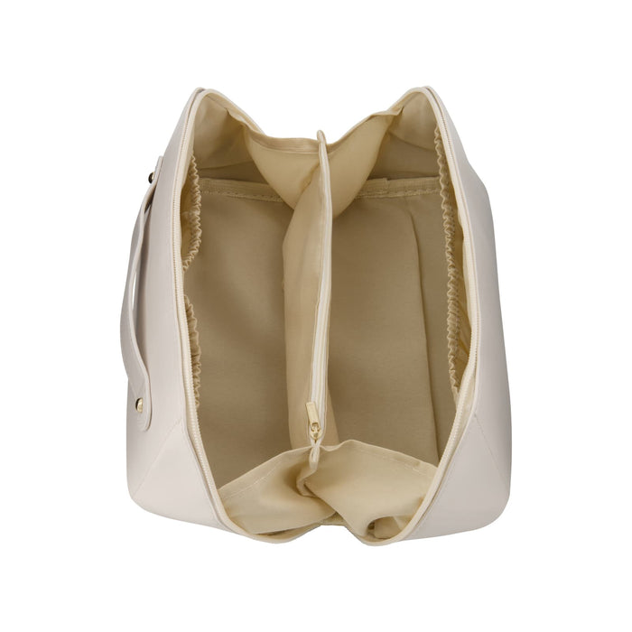 The Polished Traveller - A cream-coloured toiletry bag with a spacious interior featuring multiple compartments and a zippered section.