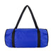 The Escape Pack - A blue duffle bag with black straps, featuring a simple design and a branding logo.