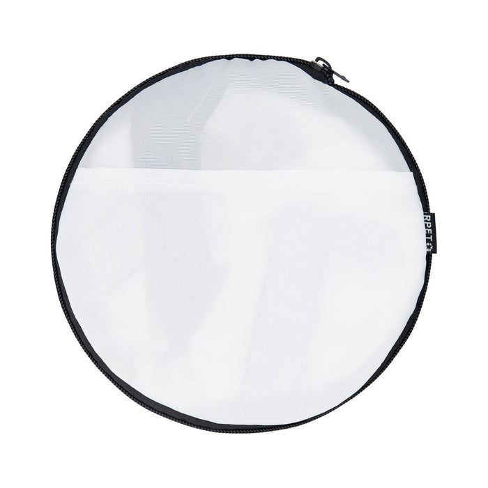 The Escape Pack - A round, mesh bag with a black zipper and trim, featuring a transparent white exterior.