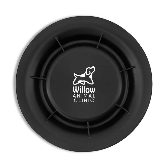 Sip n Fly Pet Bowl - A black pet bowl with a circular design and a central logo featuring a dog.