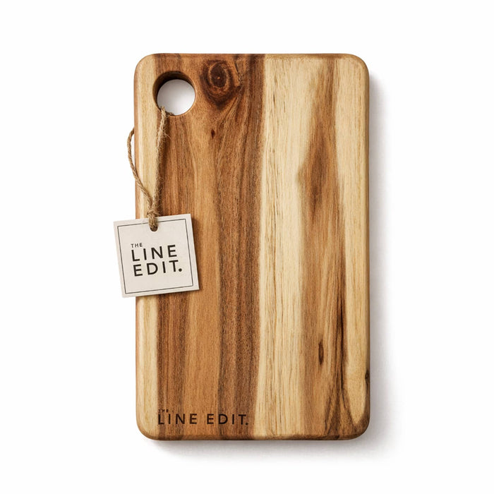 The Glow & Graze: Christmas Edition - A wooden cheese board with a smooth finish, featuring natural wood grain and a tag for branding.