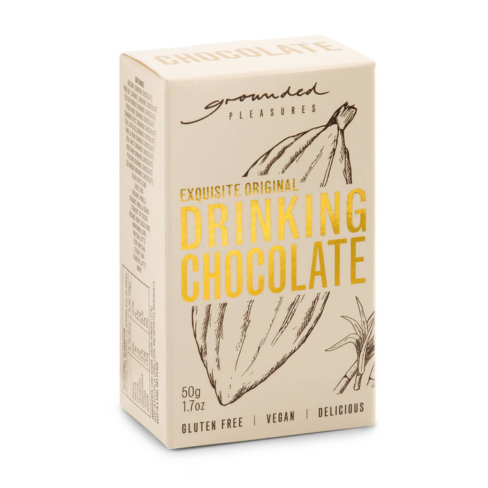 The Warm Welcome - A package of drinking chocolate in cream and beige, featuring a logo and a sketch of cocoa pods.