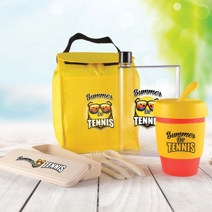 Picnic Pack - A yellow picnic set including a drink bottle, food container, cutlery, and a colorful cup, all featuring a logo.