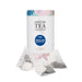 The Ultimate Welcome - Tea Edition - A tea canister with a floral design, featuring English Breakfast tea pouches in white biodegradable bags.