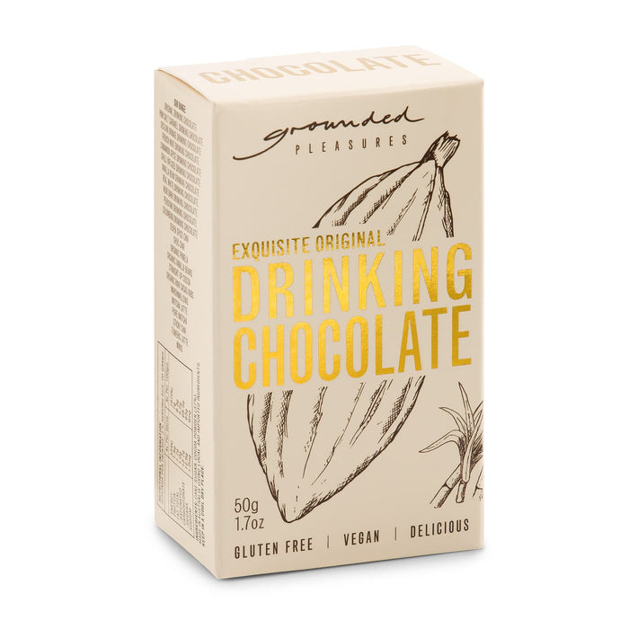 The Pause Pack: Christmas Edition - A box of drinking chocolate in beige with a logo, featuring ingredients and gluten-free, vegan labels.