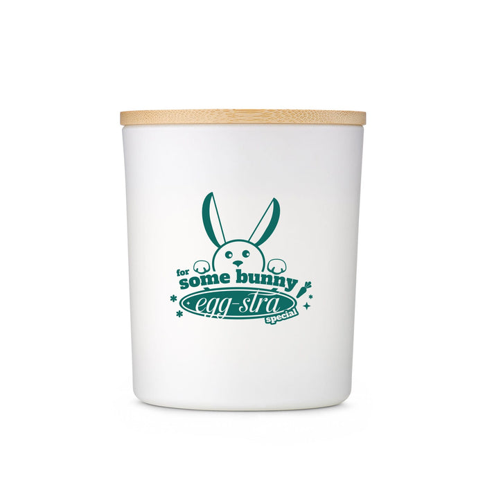 The Generous Host - A white ceramic jar with a bamboo lid, featuring a green rabbit graphic and decorative text.