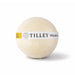 The Mindful Moment - A bath bomb in a round shape, cream-coloured with a yellow label featuring branding.