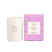The Cosy Indulgence - A white scented soy candle is accompanied by a purple box, labelled "Sweet Berries & Musk", featuring a logo.