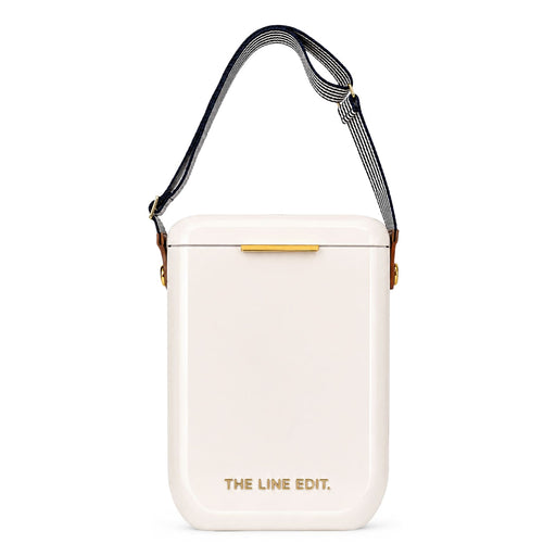 The Pour & Gather Hamper - A white insulated gift set with a gold accent and a striped shoulder strap. It features a logo on the front.