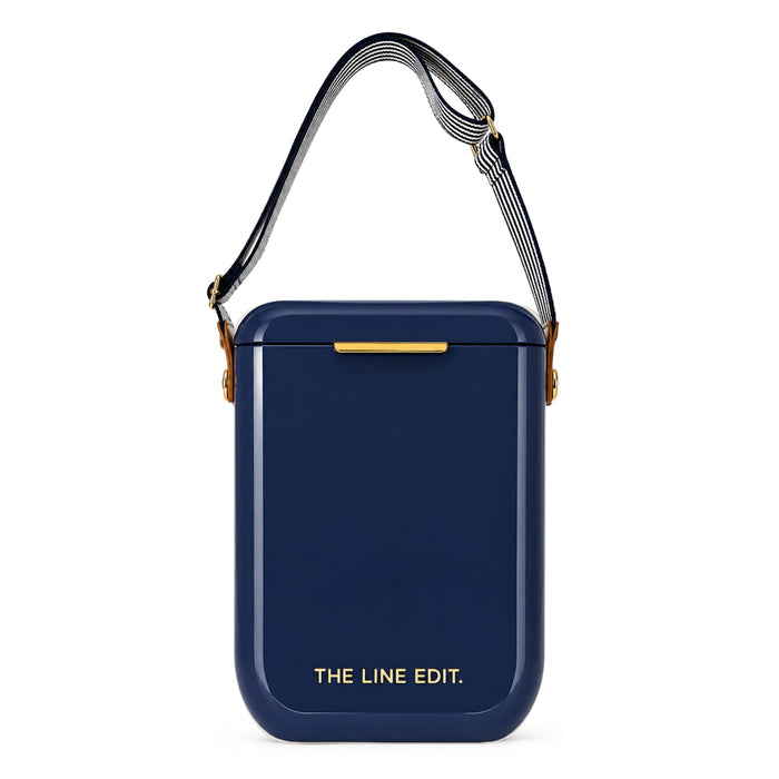 The Pour & Gather Hamper - A navy cooler bag with a shoulder strap and a logo on the front. It has a sleek, rectangular design.