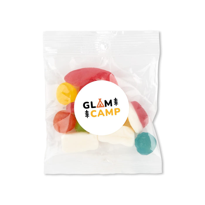 Daily Grind Pack - A clear plastic bag containing colourful gummy candies in various shapes, with a circular logo on the front.