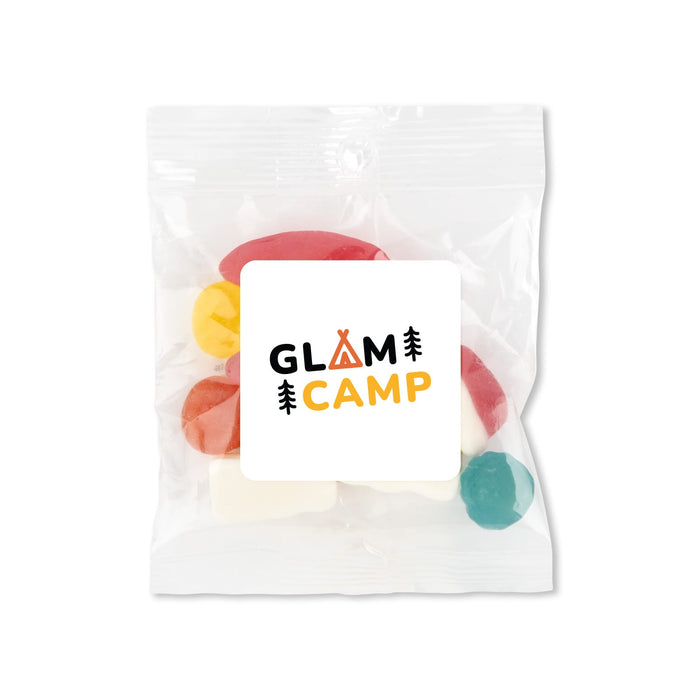 Daily Grind Pack - A clear plastic bag containing colourful candies, featuring a label with a logo.