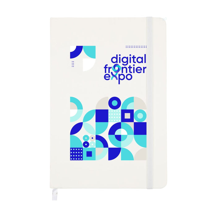 Expo Essentials Pack - A white notebook featuring geometric patterns in blue and light blue, with a logo on the cover.