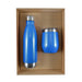 Pura Cardboard Gift Set - A blue drink bottle and a blue cup packaged together in a cardboard gift set. Both have a sleek design and silver accents.