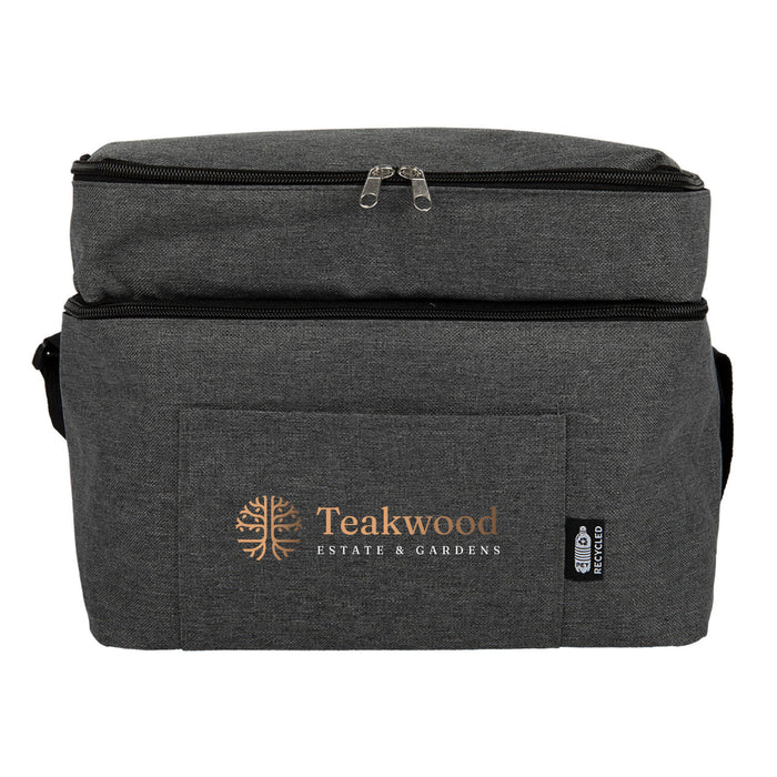 The Coastal Edit - A grey cooler bag with a zip closure and a front pocket, featuring a logo and branding.