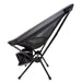The Escape Pack - A camping chair in grey with a mesh back and a cup holder, featuring a collapsible frame.