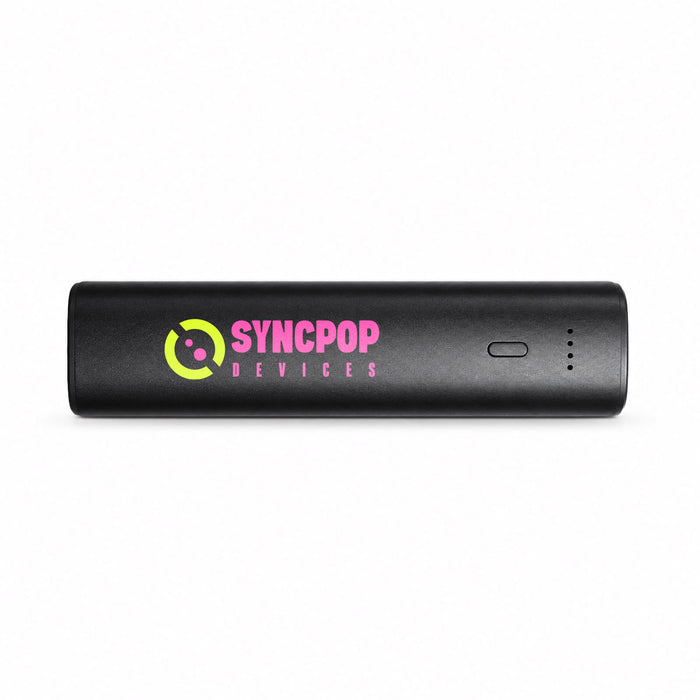 Tech Pack Charge - A black portable charger featuring a logo and indicator light. Compact design for charging devices on the go.
