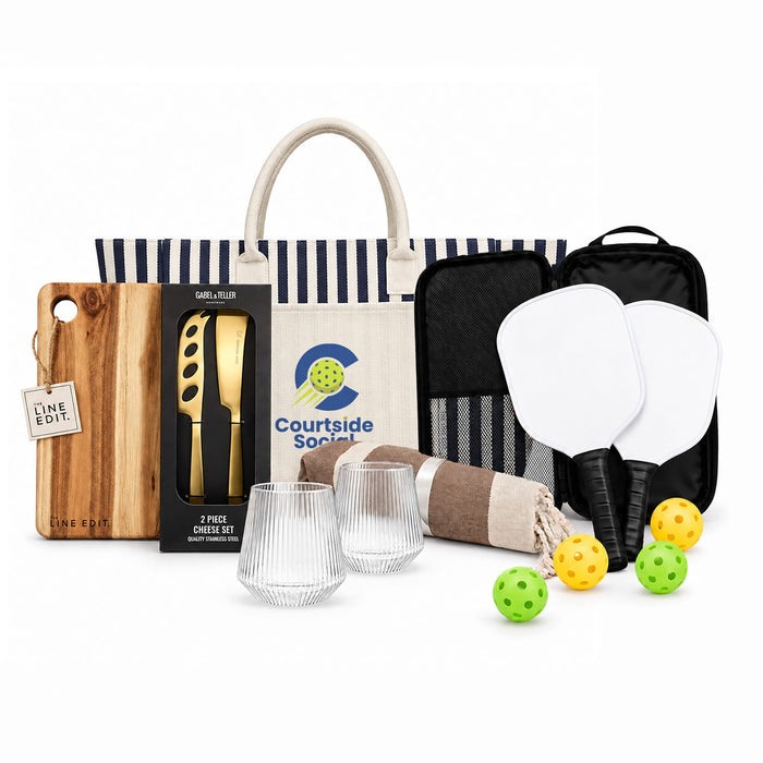 The Play & Graze - A tote bag with a striped design, a cutting board, glassware, paddles, and yellow balls. A product logo is present.