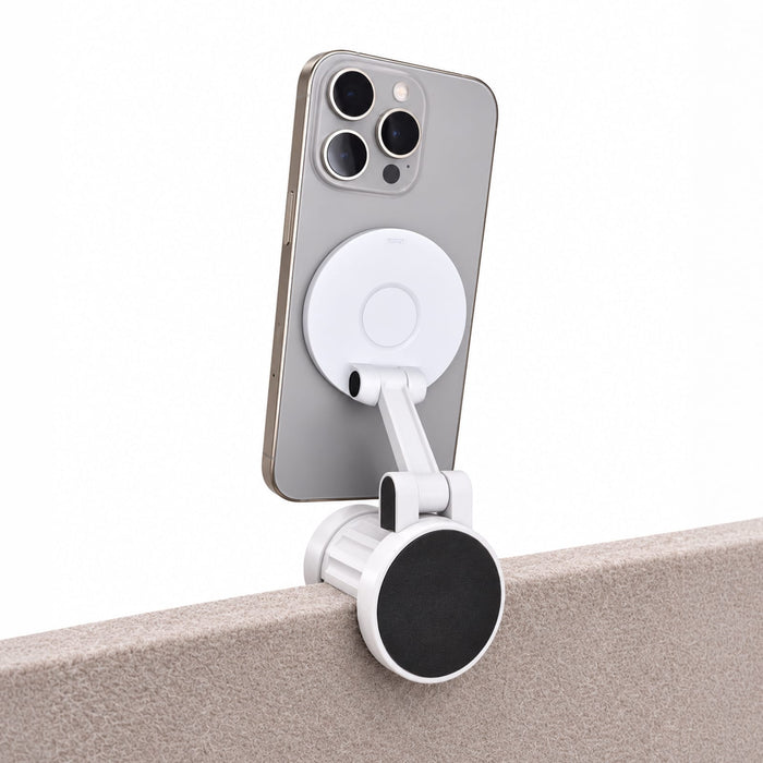 Tutor Maglock Phone Holder - A white Tutor Maglock phone holder attached to the edge of a surface, holding a smartphone securely in place.