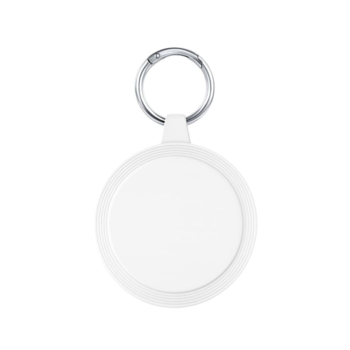 The Ultimate Welcome - Hot Chocolate Edition - A keyring with a round, white attachment featuring a textured rim, ideal for holding keys or small items.