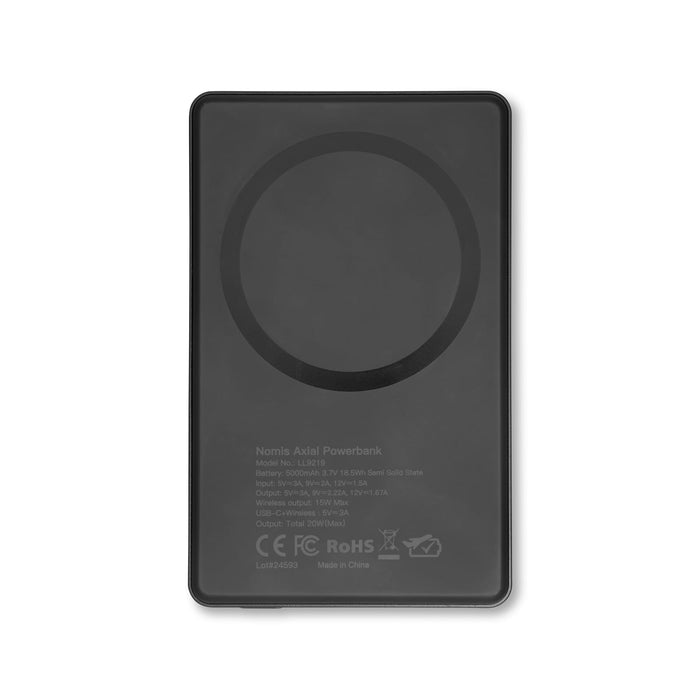 The Modern Essential Gift Set - A black solid-state power bank with a circular charging area and a logo on the surface.