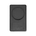 The Modern Essential Gift Set - A black solid-state power bank with a circular charging area and a logo on the surface.